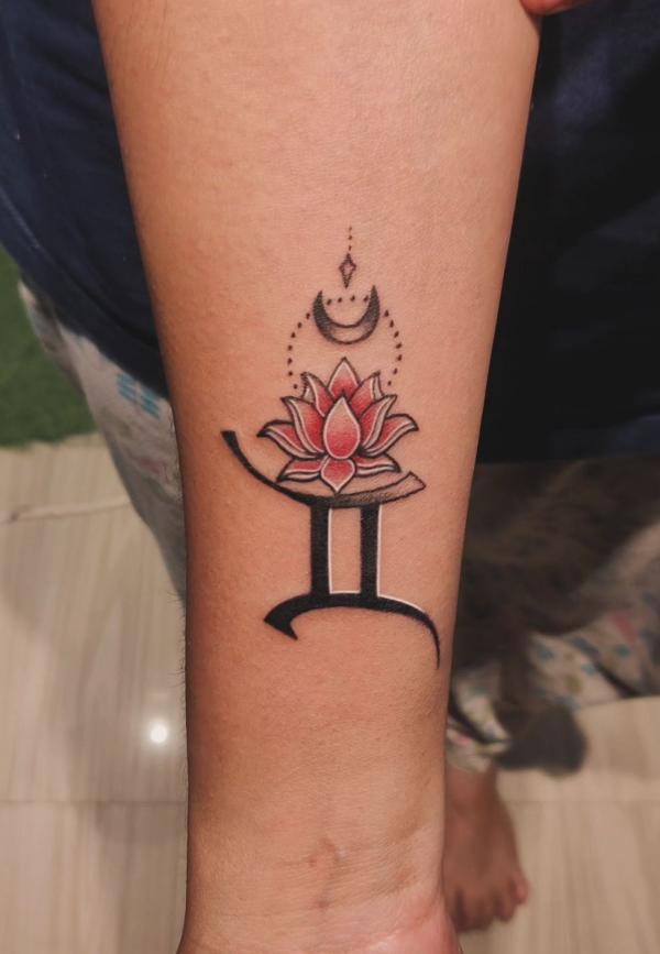 Gemini glyph with crescent moon and lotus tattoo