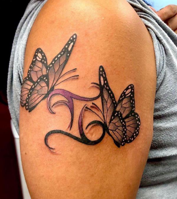 Gemini glyph with two butterfly tattoo