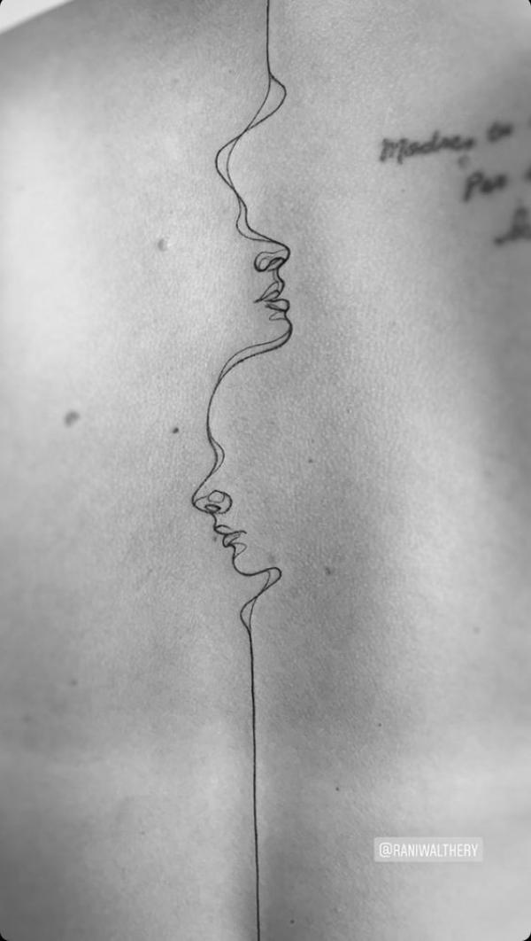 Gemini twin face line work tattoo