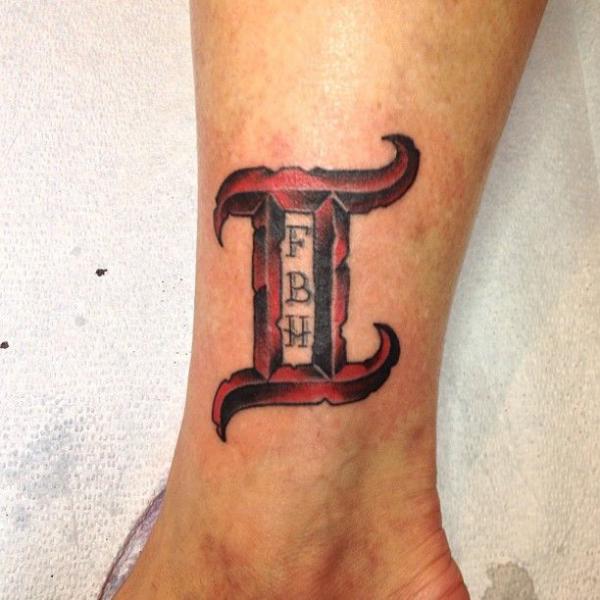 Gemini with initials tattoo