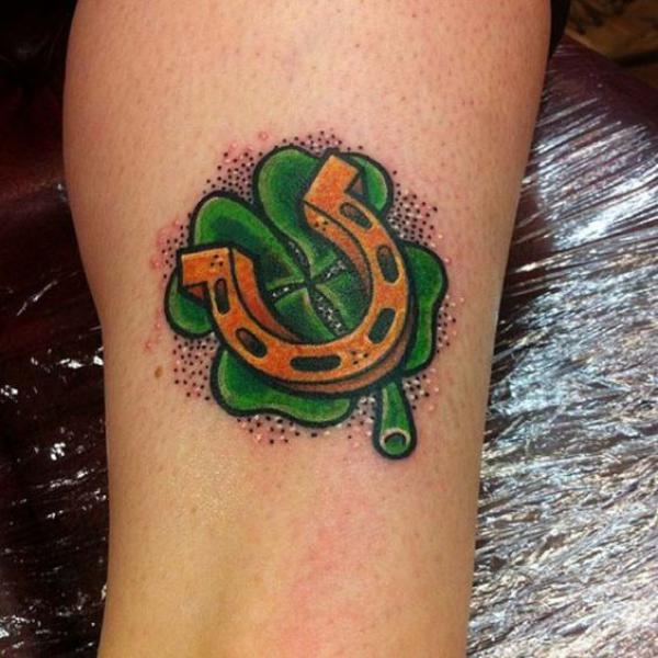 Gold horseshoe and shamrock Tattoo