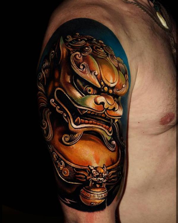 Golden Foo dog half sleeve tattoo