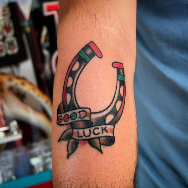 Good luck horseshoe tattoo