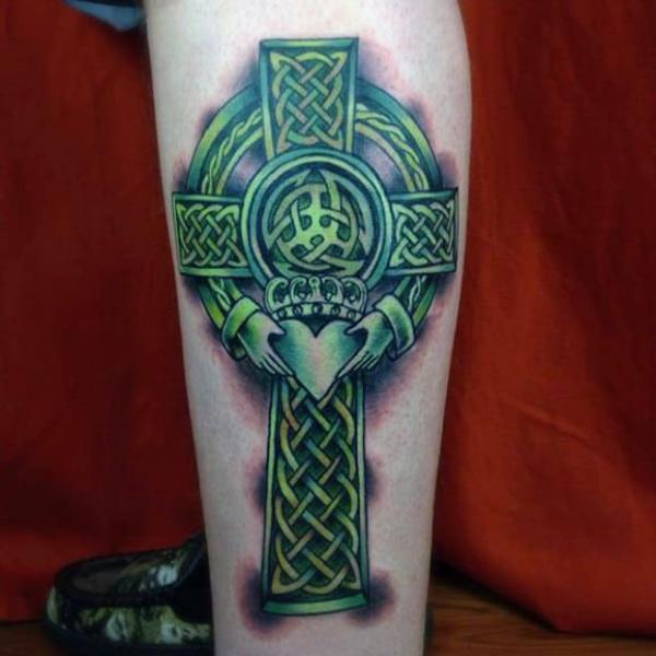 Green celtic cross with claddagh tattoo