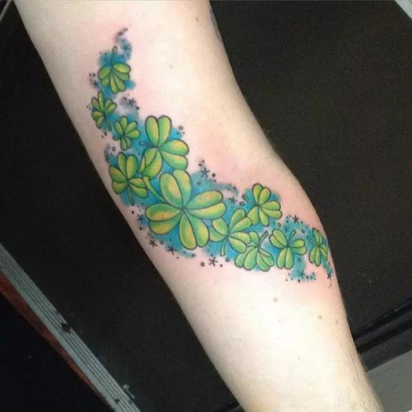 Green shamrocks tattoo