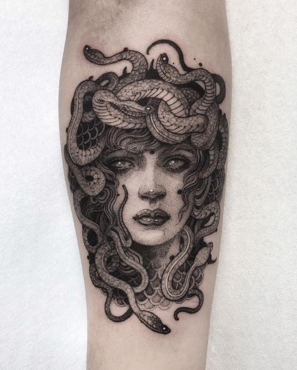 Greyscale Medusa forearm tattoo