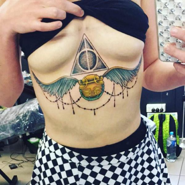 Harry Potter Golden snitch sternum tattoo