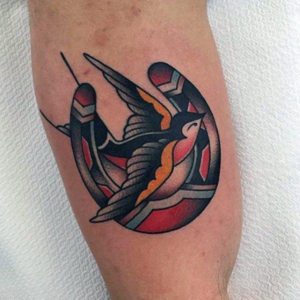 Horseshoe and swallow tattoo traditional