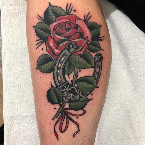 Horseshoe with rose tattoo
