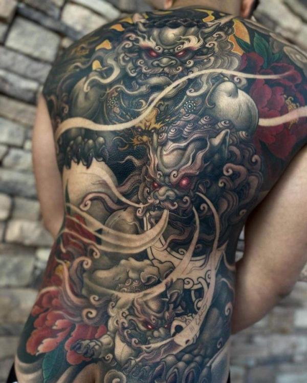 Japanese foo dog and peony full back tattoo