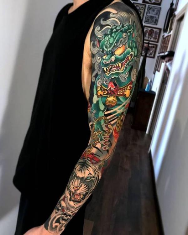 Japanese foo dog and tiger tattoo sleeve