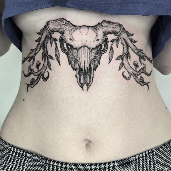 Lamb skull sternum tattoo