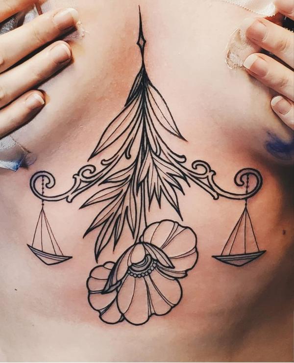 Libra and poppy line work sternum tattoo