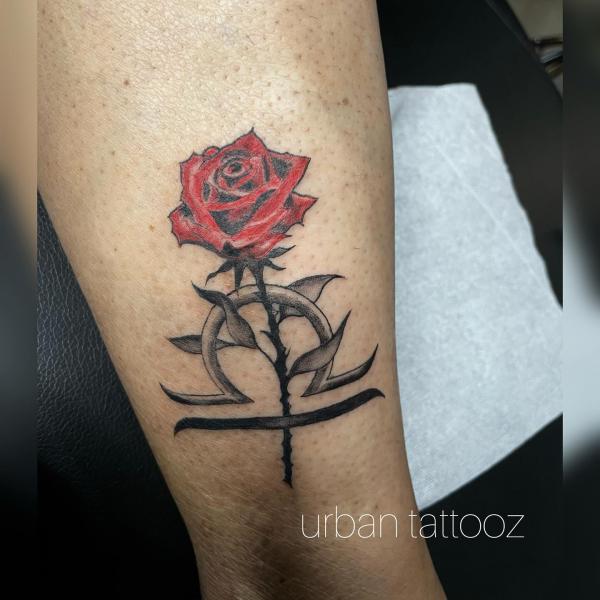 Libra and red rose tattoo