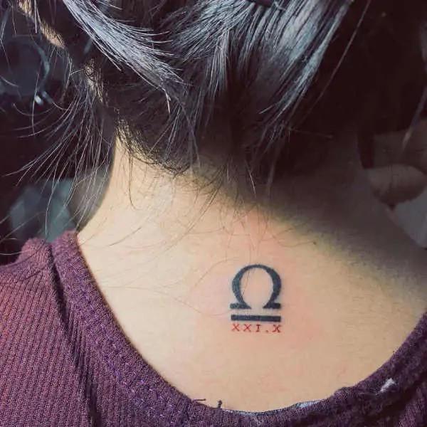 Libra back of neck tattoo