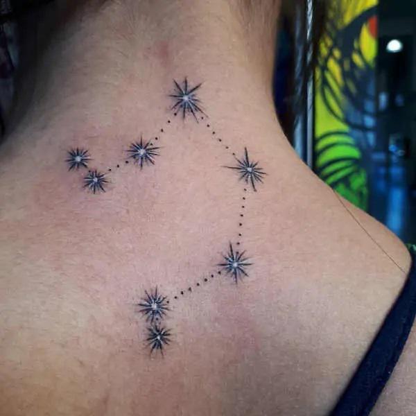 Libra constellation upper back tattoo