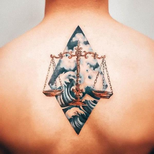 Libra scales and great wave tattoo