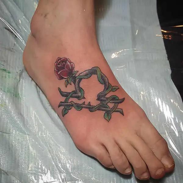 Libra sign with rose foot tattoo
