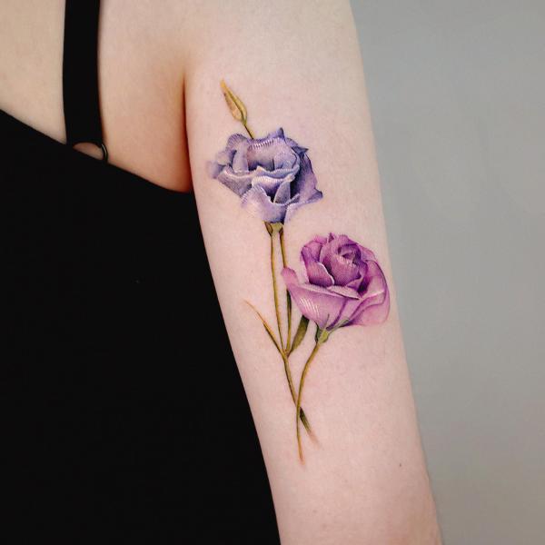 Lisianthus back of arm tattoo