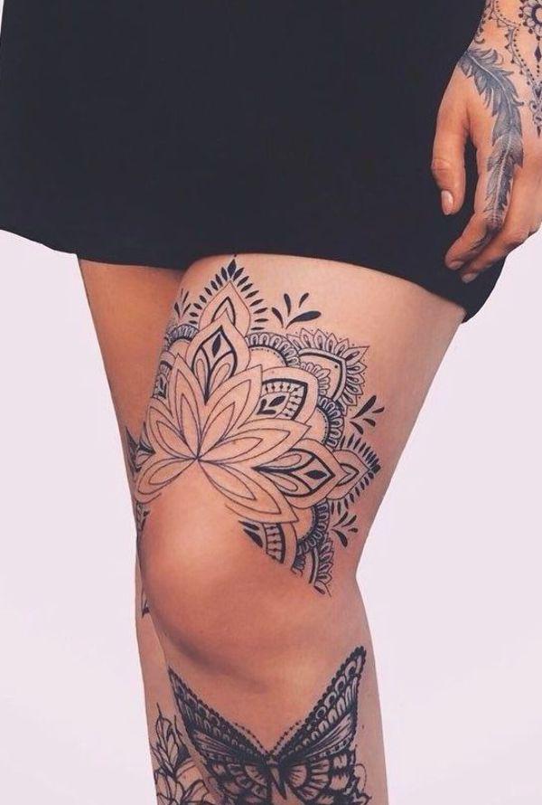 Mandala above knee tattoo black and grey