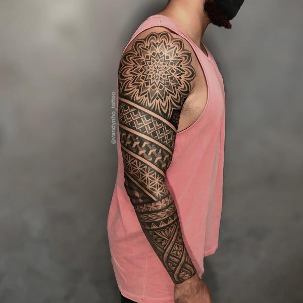 Mandala and tribal tattoo sleeve