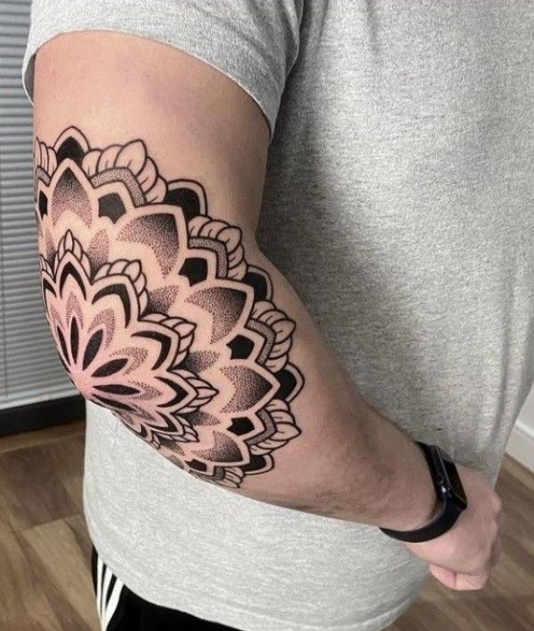 Mandala elbow dotwork tattoo