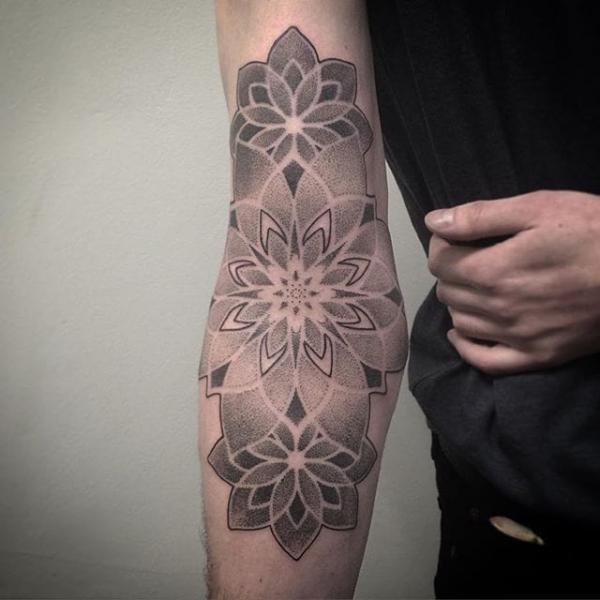 Mandala flower inner elbow tattoo