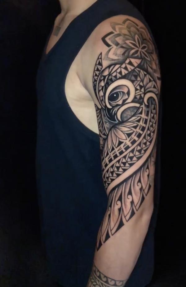 Mandala tribal half sleeve with eye tattoo