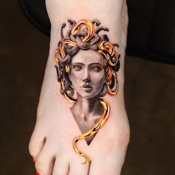 Medusa foot tattoo