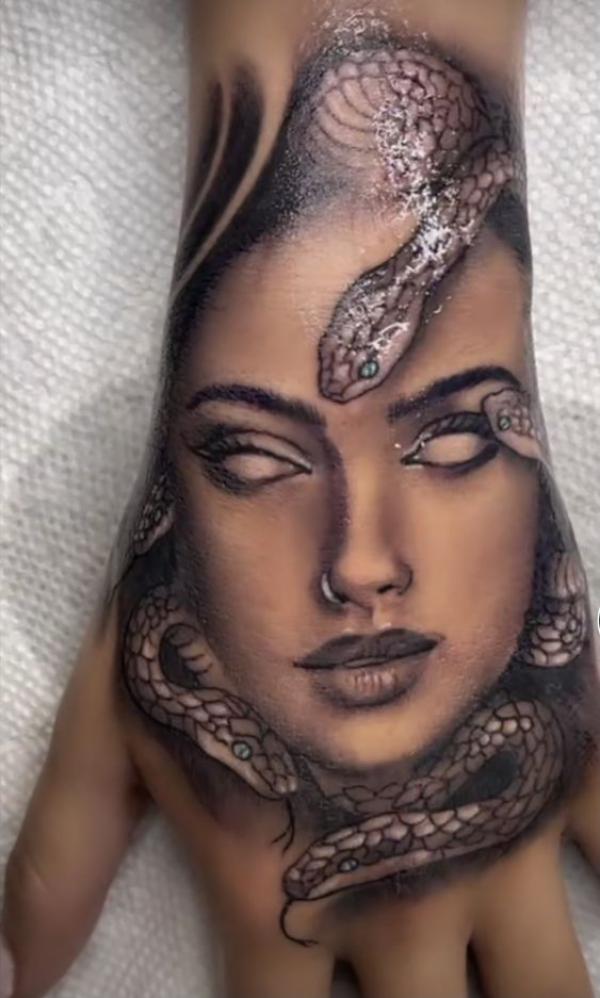 Medusa hand tattoo