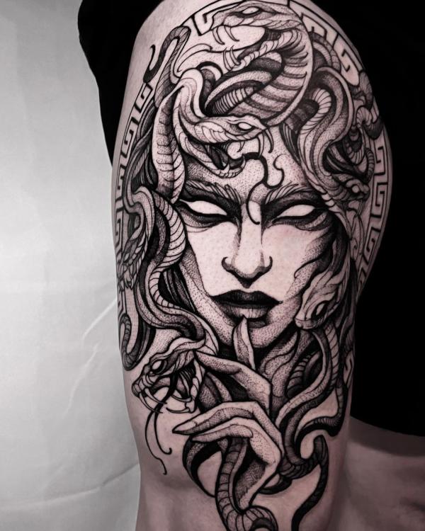 Medusa with Greek key back of arm tattoo