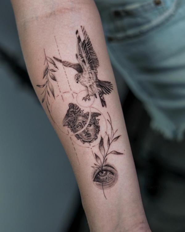 Medusa with eagle and eye tattoo