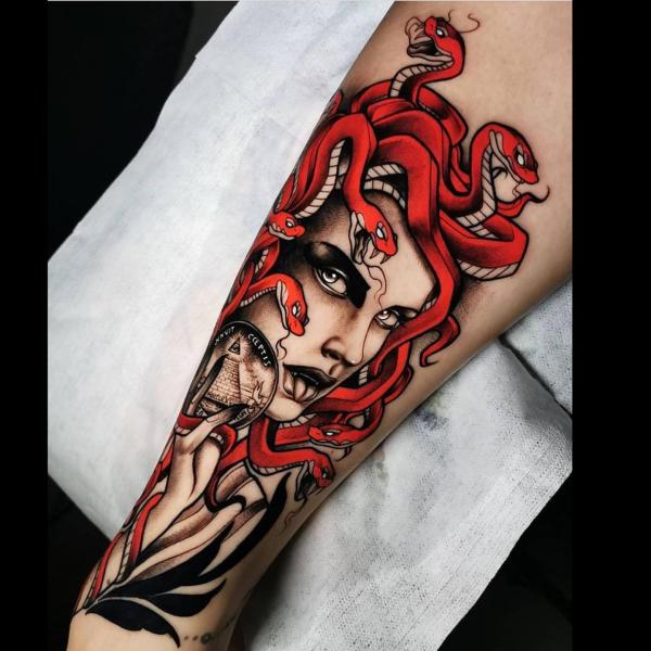 Medusa with red snakes tattoo