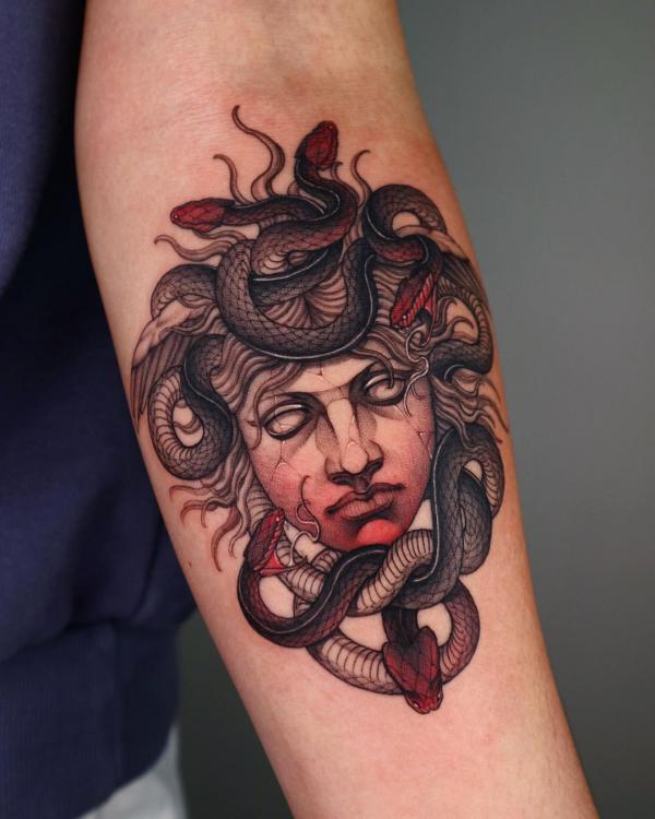 Medusa with snakes forearm tattoo