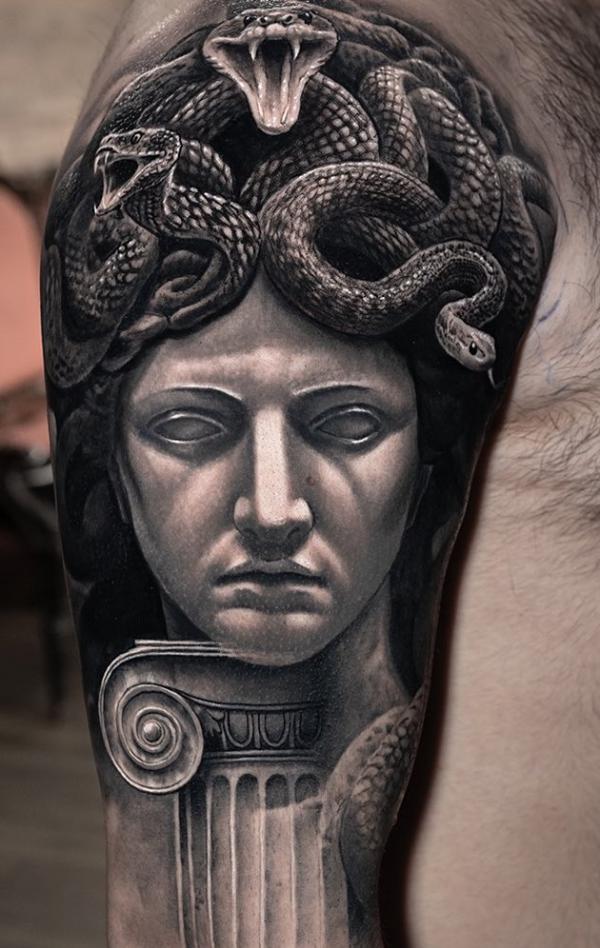 Medusa with snake half sleeve tattoo