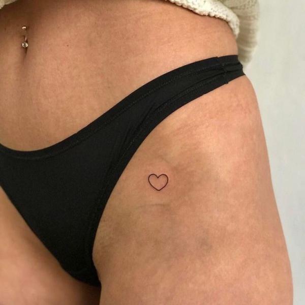 Minimalist Bikini line heart tattoo