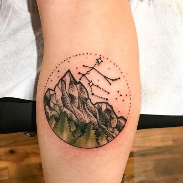 Mountain with constellation and stars tattoo