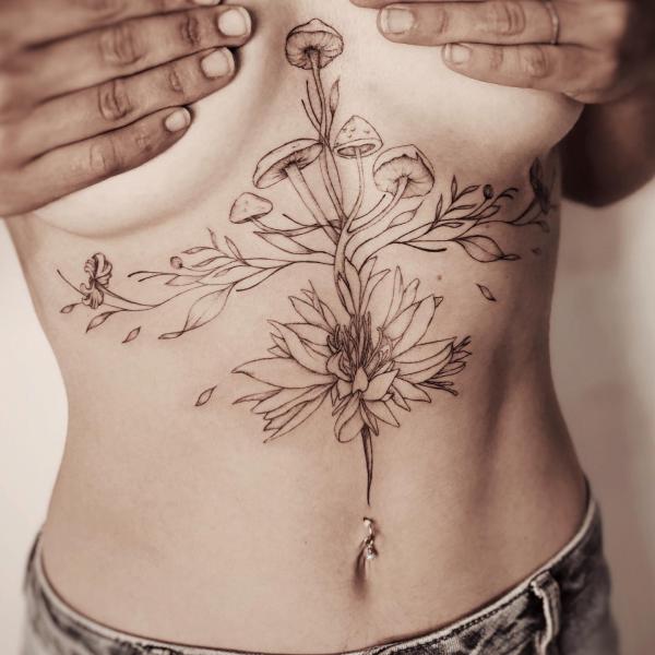 Mushroom sternum tattoo