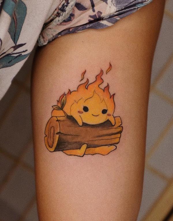 Neo traditional Calcifer bicel tattoo