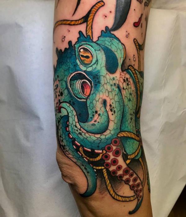 Neo traditional octopus elbow tattoo