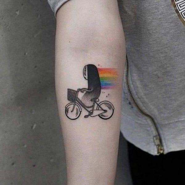 No Face riding a bicycle tattoo