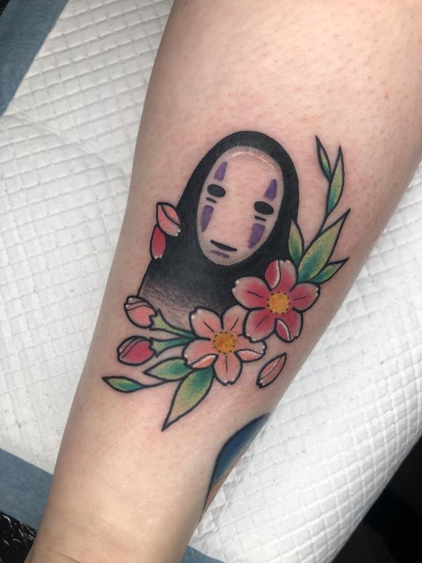 No Face with flower tattoo