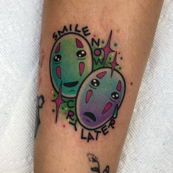 No face mask tattoo with quote Smile Now Cry Later