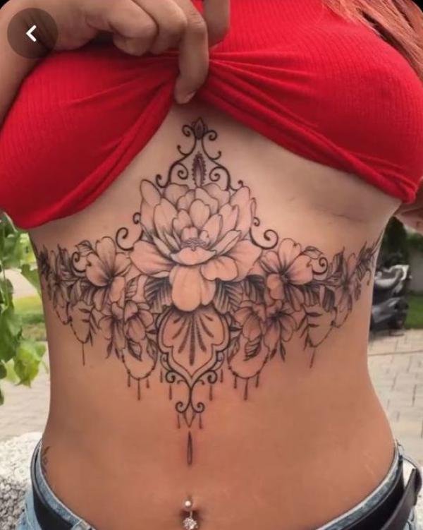 Peony flower with pendant sternum tattoo