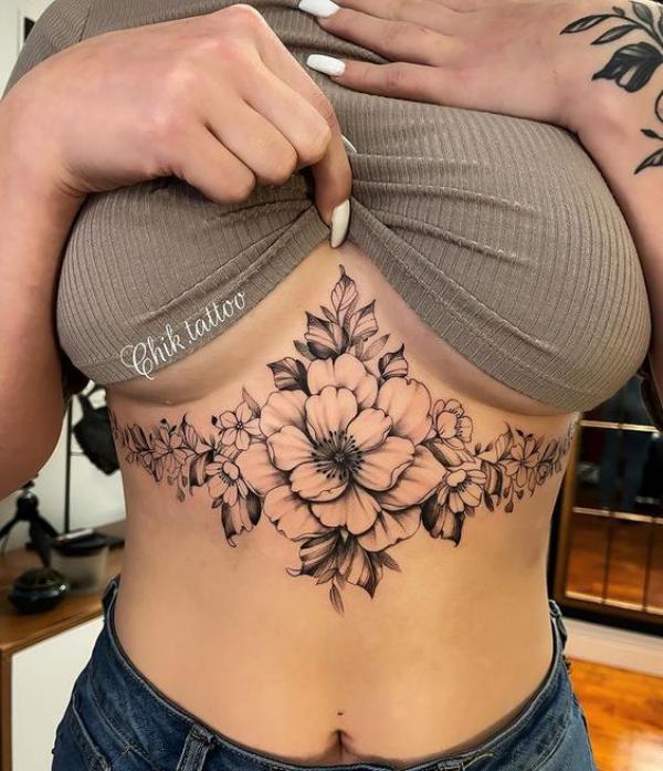Peony flowers sternum tattoo