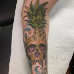 Pineapple Skull forearm tattoo