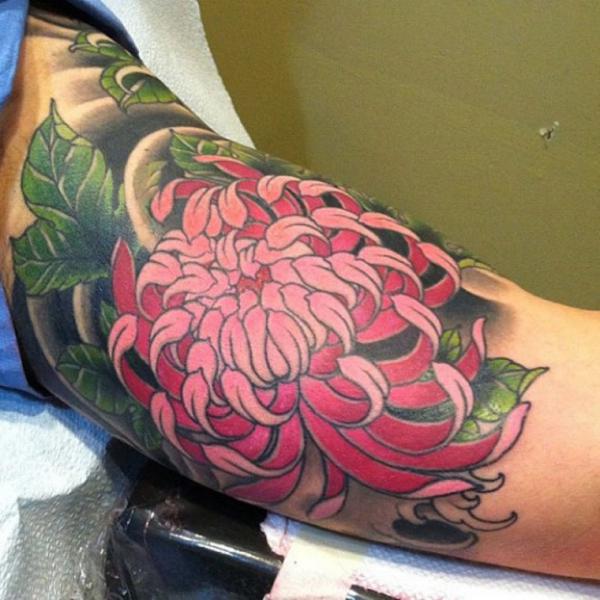 Pink and red chrysanthemum elbow tattoo