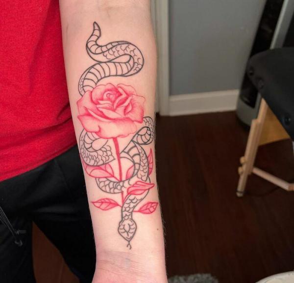 Pink rose and snake outline tattoo