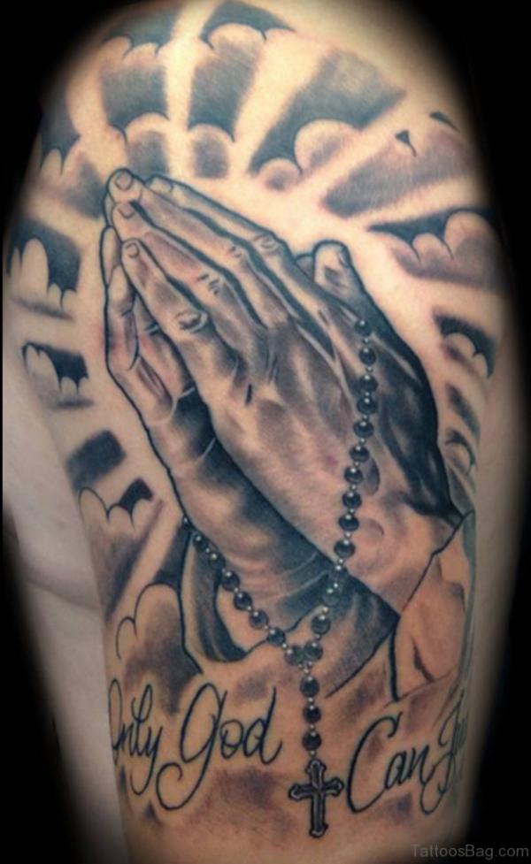 Praying hands with halo