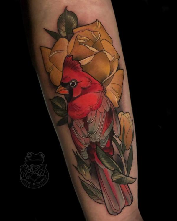 Red cardinal and yellow rose tattoo
